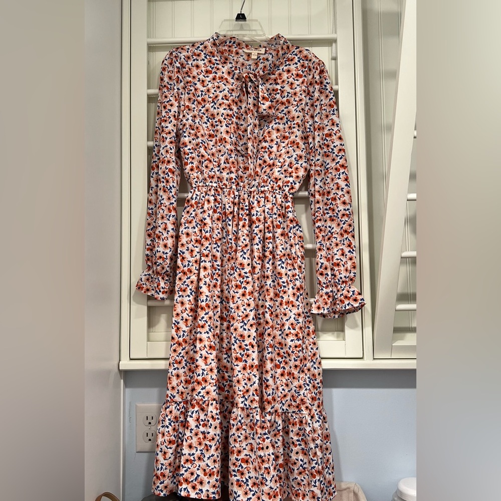 Boutique tie neck dress with ruffles